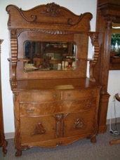 An appropriate photo about that time (1949) - a cabinet somewhat similar to the old highboy, but not exactly the same. Ours was bought by grandpa from the Sears Catalogue.