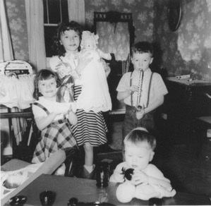 Note in this Christmas photo Charis is in cowboy boots. I remember asking for a saxophone and getting one.